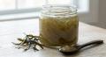 Jar of sea moss gel with fresh seaweed