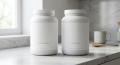 Whey protein concentrate and whey isolate tubs side by side
